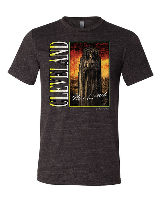 Black t-shirt with 'CLEVELAND' and 'THE LAND' text on the front and a graphic of a sports stadium on the back.