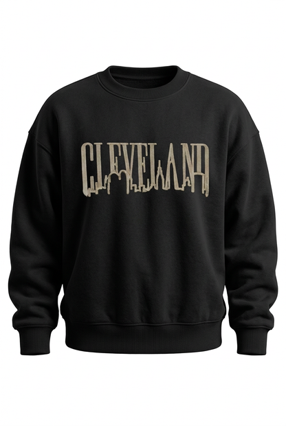 Black fleece crewneck sweatshirt with ribbed collar, cuffs and waistband and taupe Cleveland Jagged Skyline chest design.