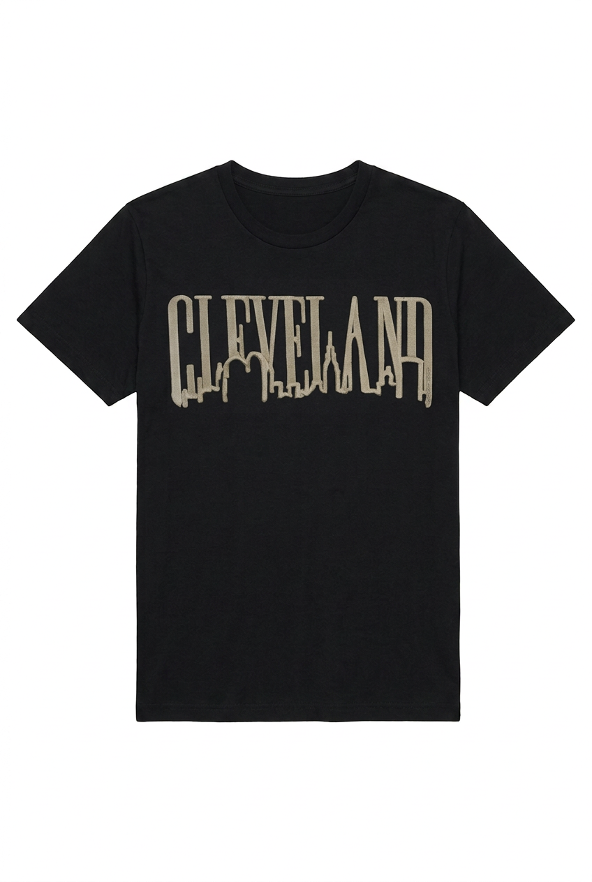 Black unisex short-sleeve T-shirt with taupe Cleveland Jagged Skyline lettering.